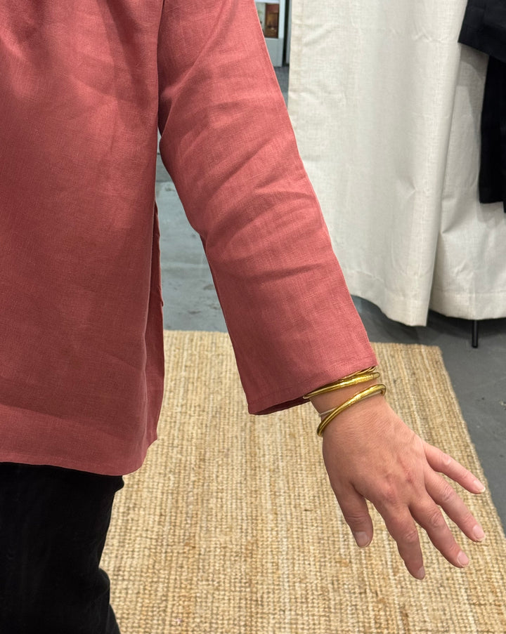 close up image of linen long sleeve top sleeve length