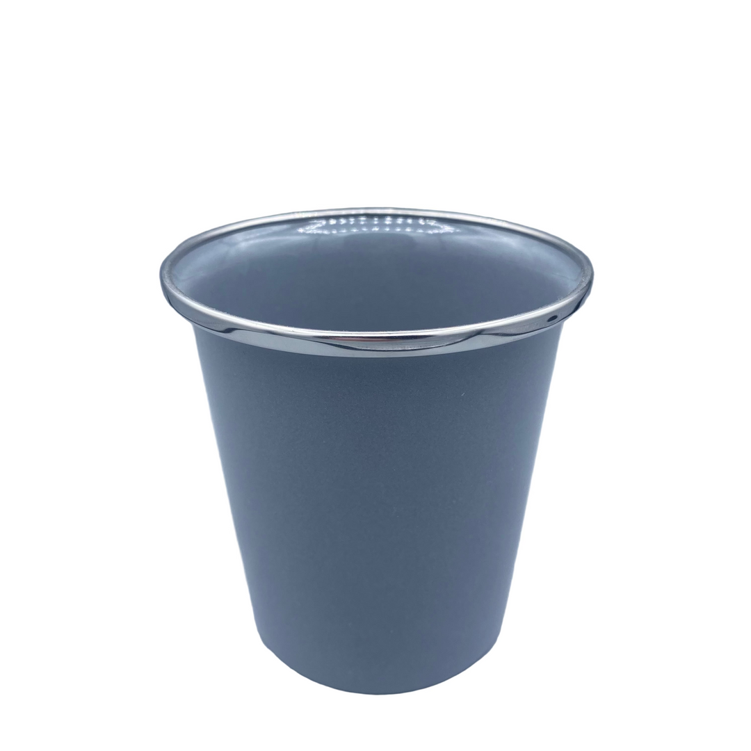 Gray plastic cup with a silver rim on a gray background