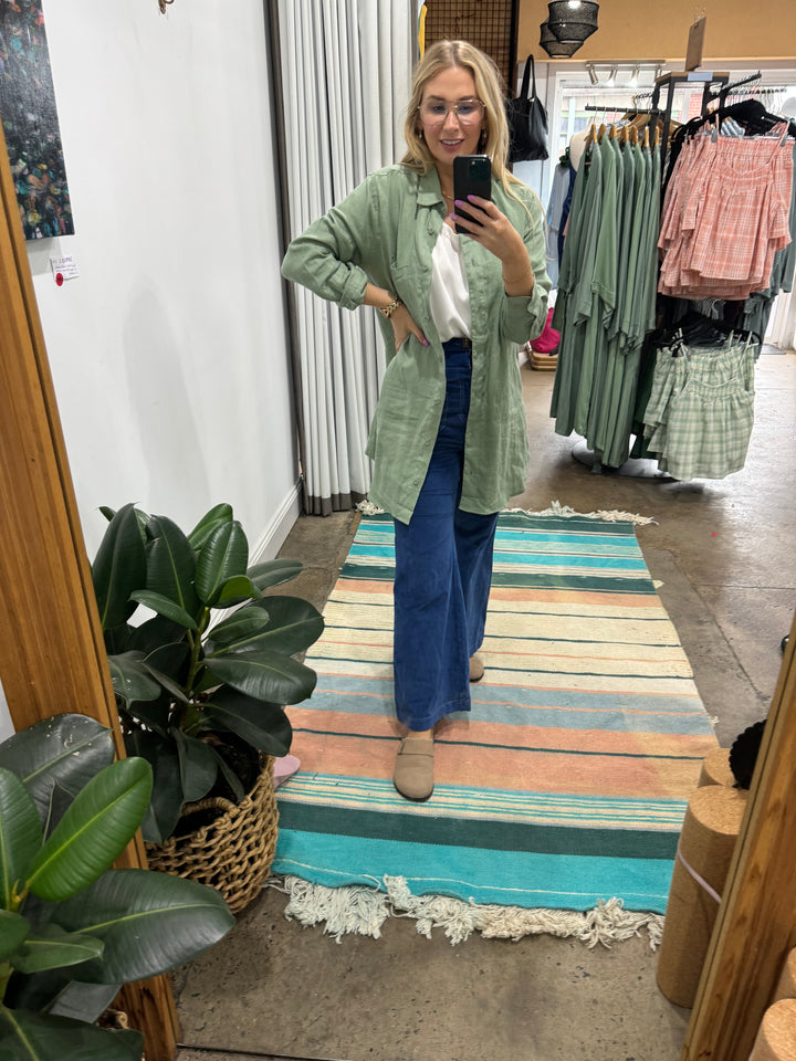 green long linen shirt worn with jeans at jade and may