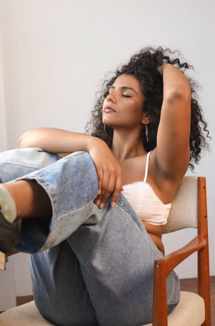 White linen bralette with soft natural texture and adjustable straps, ethically made from 100% linen by Jade and May