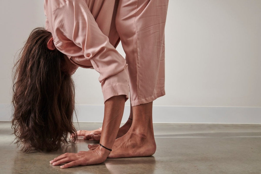 Benefits of the Uttanasana Pose for Sleep - Jade and May