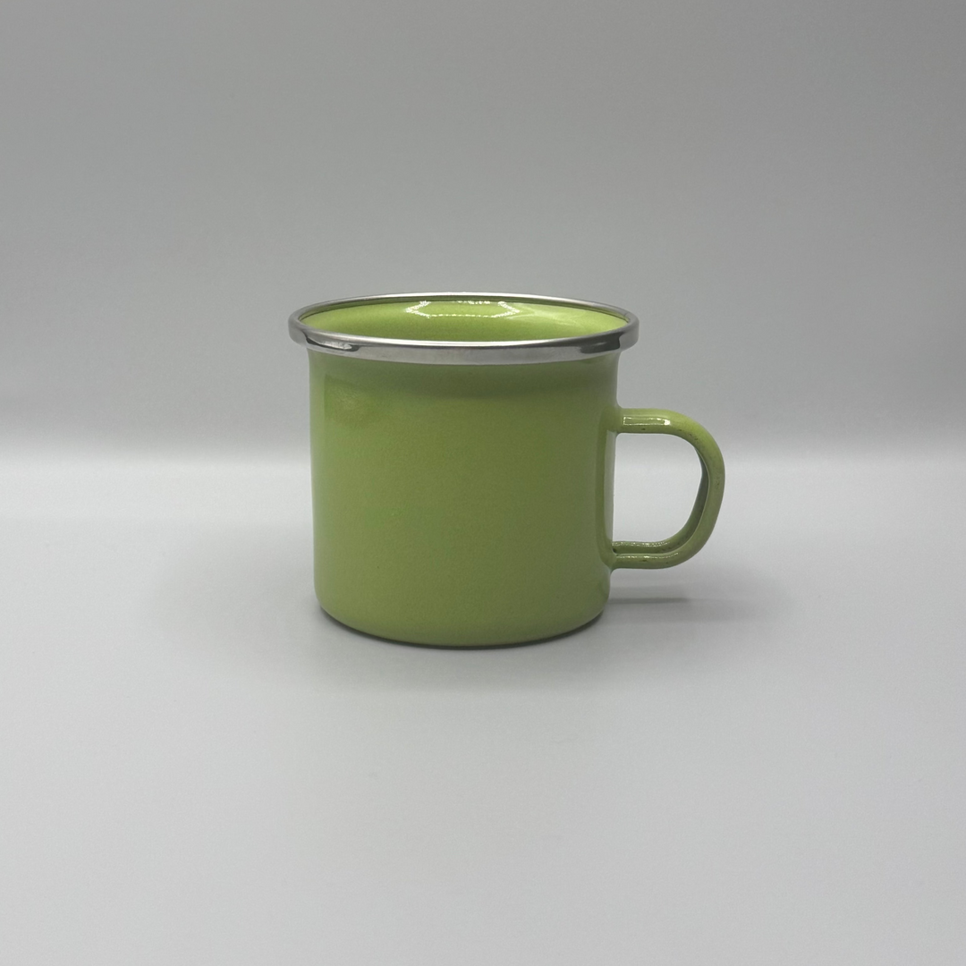 Green mug on a gray background