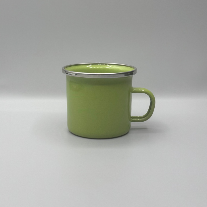 Green mug on a gray background